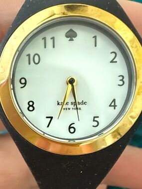 kate spade black silicone watch with gold bezel and white dial EUC